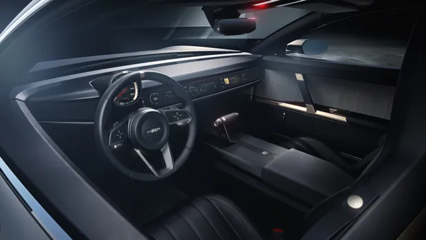 The cabin from the passenger side, showing upholstery and dashboard together